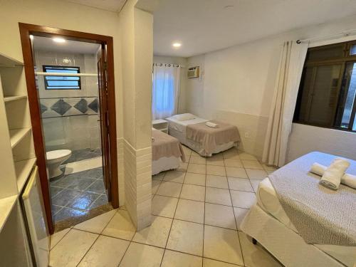 Una cama o camas en una habitación de Pousada Barbroch