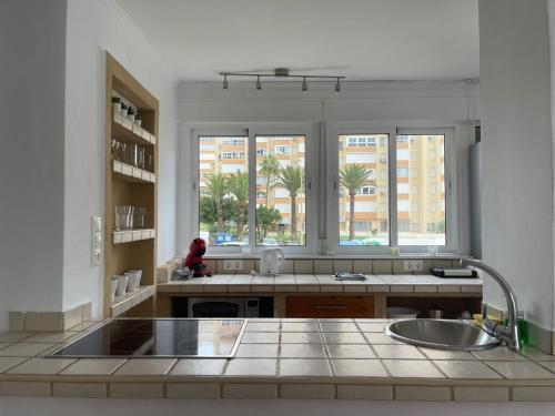 Kuchyň nebo kuchyňský kout v ubytování Apartamento Torrox Vibes Frente al Mar