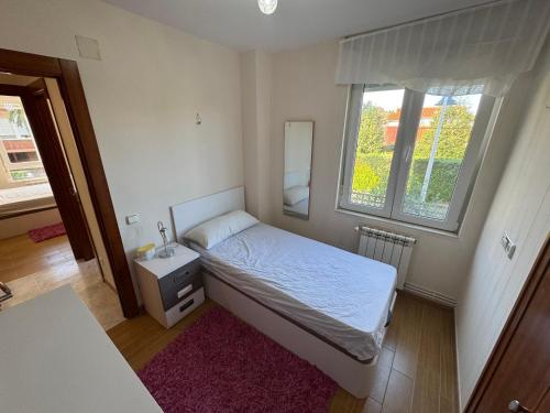 Ένα ή περισσότερα κρεβάτια σε δωμάτιο στο Nuevo!Suances Garaje 5 min playa