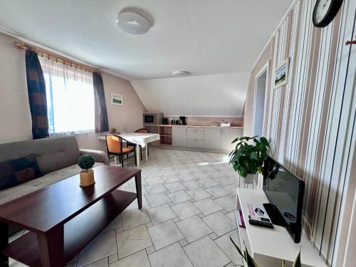 Posezení v ubytování Nemes Apartmanház