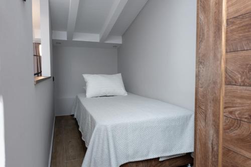 Ένα ή περισσότερα κρεβάτια σε δωμάτιο στο ridos house