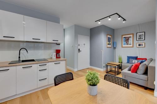 Η κουζίνα ή μικρή κουζίνα στο Staywin Apartments Chmielna Park