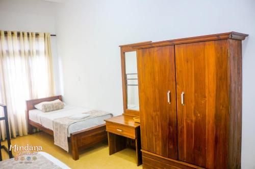 Postel nebo postele na pokoji v ubytování Mindana Residence