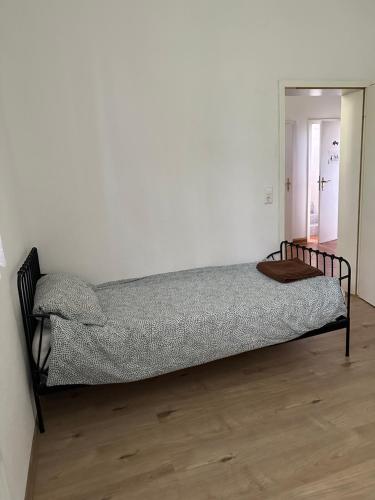 Postel nebo postele na pokoji v ubytování A&E Rooms