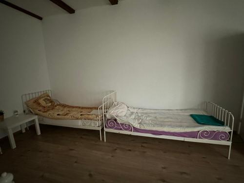 Postel nebo postele na pokoji v ubytování A&E Rooms