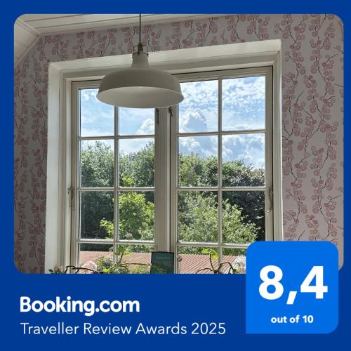 a window in a room with a view at SleepOrup in Faxe