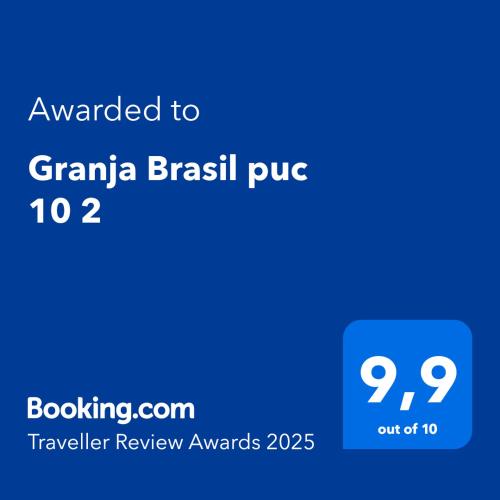a blue text box with the text awarded to grandma brazil pub at Granja Brasil puc 10 2 in Petrópolis