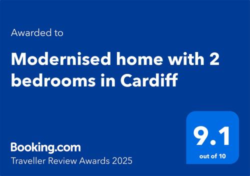 a blue sign with the textomedained home with bedrooms in caritt at Modernised home with 2 bedrooms in Cardiff in Cardiff