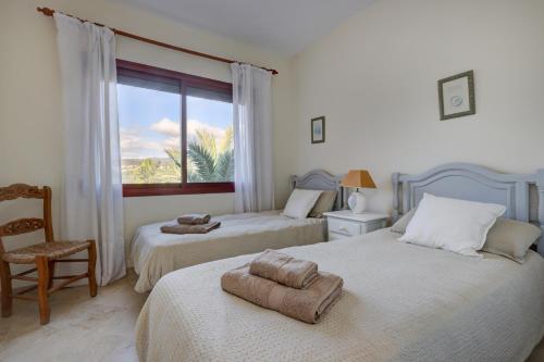 Ένα ή περισσότερα κρεβάτια σε δωμάτιο στο Ático vista mar en Alicate Playa