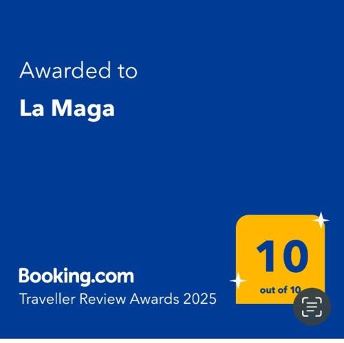 a yellow sign that says awarded to la magaza at La Maga in Santa Rosa de Calamuchita