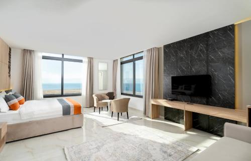 TV a/nebo společenská místnost v ubytování Diamond Palm Hotel & Resort