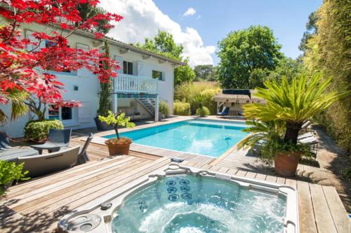 Superbe villa de plage avec piscine chauffée et jacuzzi proche des plages