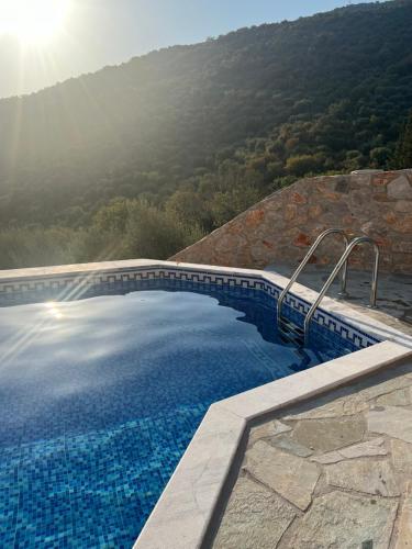 Ảnh trong thư viện ảnh của Maison charme avec piscine privée, près de la mer à Sappounakeika, Tyros ở Sapounakaíika