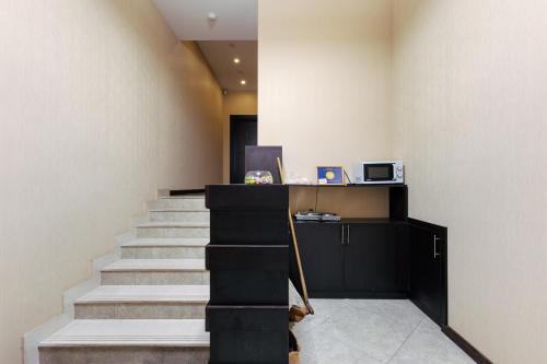 a staircase in a room with a stair case at Residence North Avenue, Teryan 8. 14 2 in Yerevan