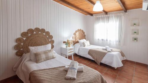 Postel nebo postele na pokoji v ubytování Villa Jimena Nerja by Ruralidays