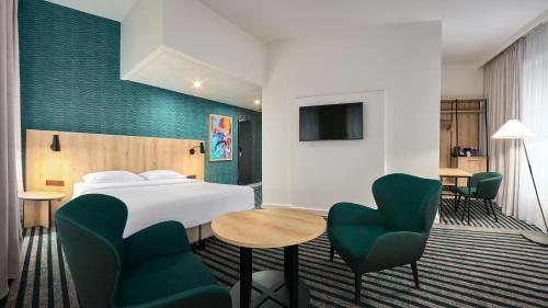 Postel nebo postele na pokoji v ubytování Park Inn by Radisson Brussels Centre Midi