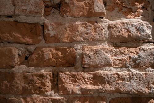 an old brick wall useful as a background at OFFICINE CAVOUR Piazza Cavour in Padova