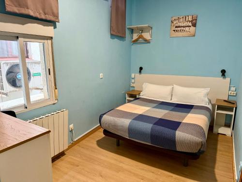 Ένα ή περισσότερα κρεβάτια σε δωμάτιο στο CH Casillas