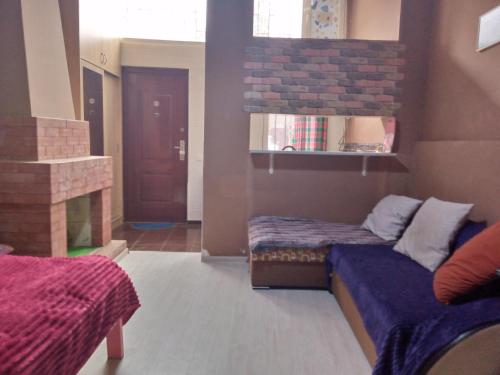 Postel nebo postele na pokoji v ubytování birdhome in Tbilisi (Maria)