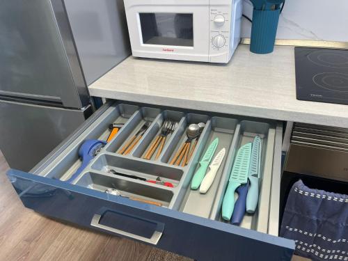 a drawer in a counter with tools in it at Casa Los Jarales - Isla de El Hierro in Jarales