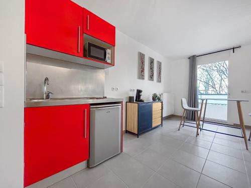 Dapur atau dapur kecil di Studio Lumineux Avec Balcon