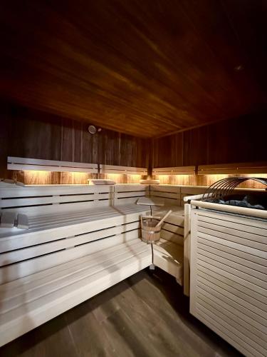 Ένα ή περισσότερα κρεβάτια σε δωμάτιο στο ELSA Spa Apartments Tux