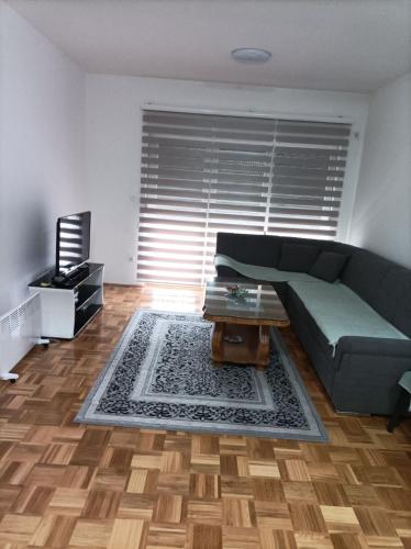Area soggiorno di VA Apartmani Živinice