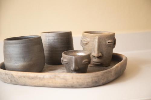 a group of pottery bowls sitting on a plate at El Consuelo in Oaxaca City