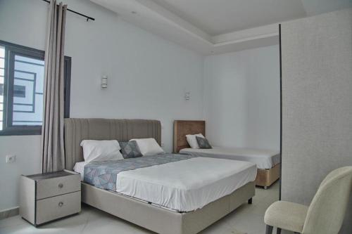 Llit o llits en una habitació de Bella Villa