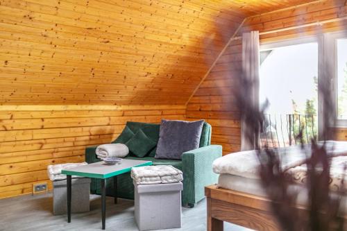 Ruang duduk di Holzhaus am Waldrand