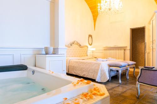 Postel nebo postele na pokoji v ubytování Self Palazzo Aurora