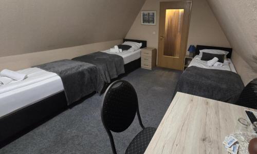 Postel nebo postele na pokoji v ubytování Hotel-Gasthof "Alter Ritter"