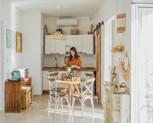 A kitchen or kitchenette at Casa Tua - Sea View Onda