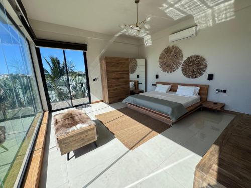 Ένα ή περισσότερα κρεβάτια σε δωμάτιο στο Green Creek Villa