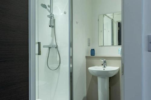 a bathroom with a shower and a sink at For Students Only Radford Mill in Nottingham in Nottingham