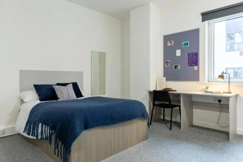 a bedroom with a bed and a desk and a deskablish at For Students Only Radford Mill in Nottingham in Nottingham