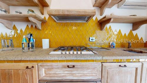 Η κουζίνα ή μικρή κουζίνα στο Villa Abbaiola - Porto Cervo Marina