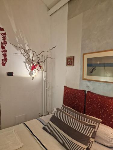 Postel nebo postele na pokoji v ubytování B&B La Riva del Po Camera indipendente