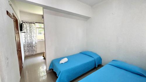 Cama o camas de una habitación en Hotel Mirador del Sumapaz - Comfacundi