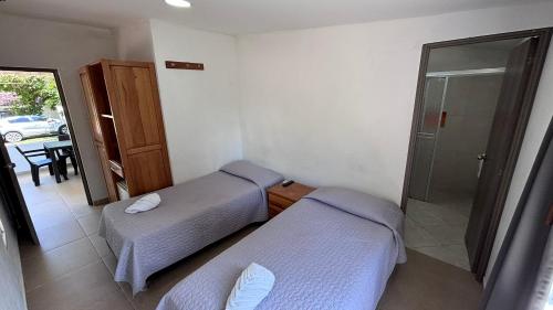 Cama o camas de una habitación en Hotel Mirador del Sumapaz - Comfacundi