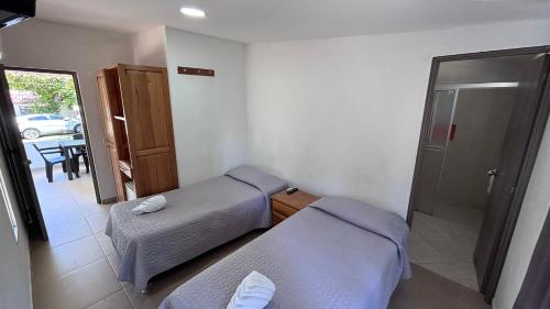 Cama o camas de una habitación en Hotel Mirador del Sumapaz - Comfacundi