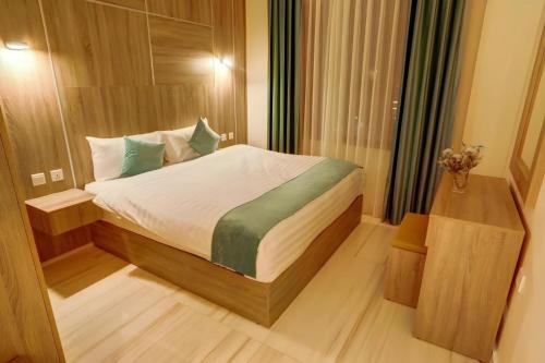 Кровать или кровати в номере Turquoisejo Hotel