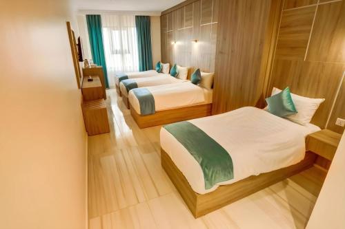 Кровать или кровати в номере Turquoisejo Hotel