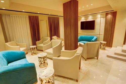 Телевизор и/или развлекательный центр в Turquoisejo Hotel