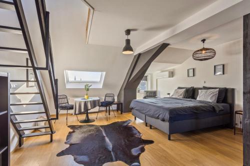Postel nebo postele na pokoji v ubytování B&B Leopold & Appartementen