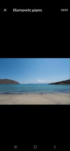 two pictures of a beach with a blue sky at Lovely House Infront Of The Beach In Molos in Molos Parou