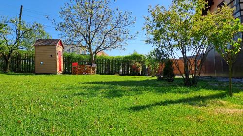Zahrada ubytování DOUX Apartman