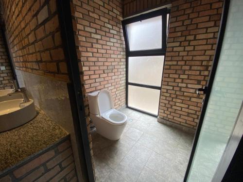Ένα μπάνιο στο Cosy Kibuye Villa