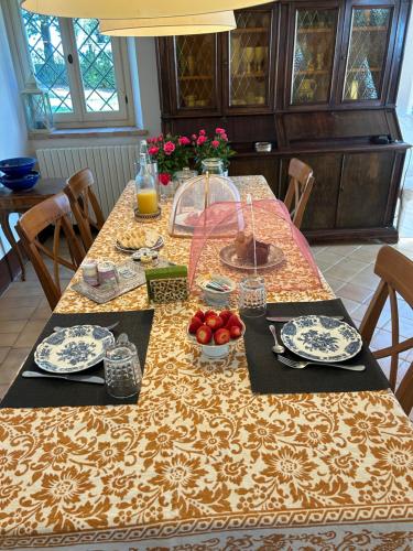 a table with plates of food on top of it at Agriturismo Bibiano38 in Treia