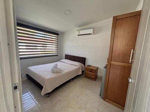 Cama o camas de una habitación en Hotel Mirador del Sumapaz - Comfacundi